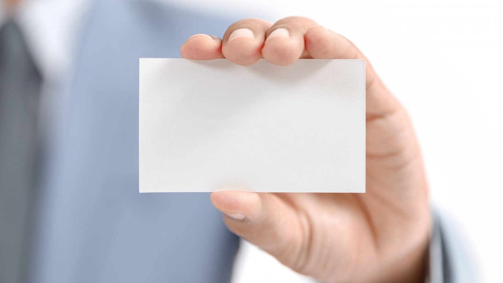 Business people with card 47