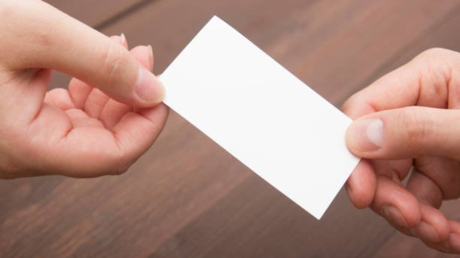 business executive exchanging business card